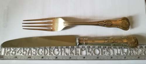 Sterling set of 12 knives and forks