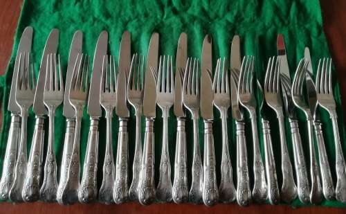Sterling set of 12 knives and forks