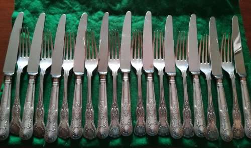 Sterling set of 11 knives and forks