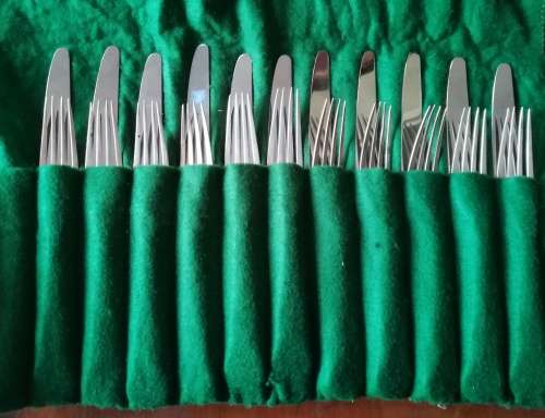 Sterling set of 11 knives and forks