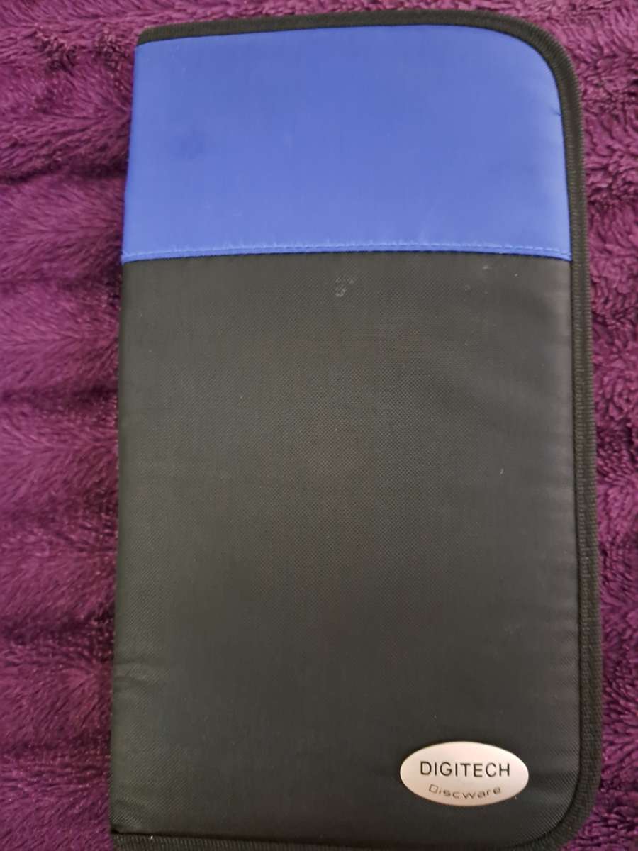 Music CDS. WITH POUCH ABOUT 60CDS MUSIC MUSIC