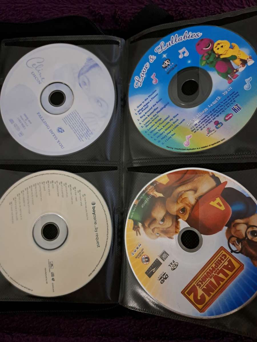 Music CDS. WITH POUCH ABOUT 60CDS MUSIC MUSIC