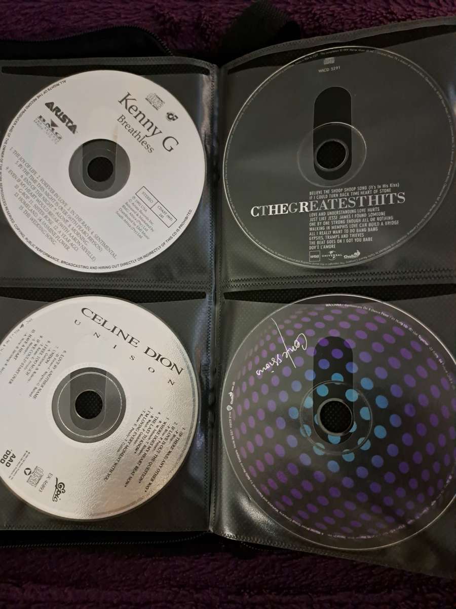 Music CDS. WITH POUCH ABOUT 60CDS MUSIC MUSIC