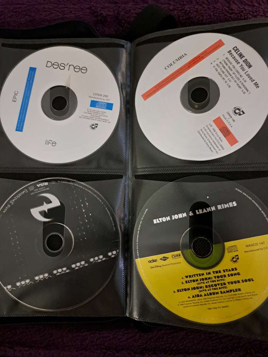 Music CDS. WITH POUCH ABOUT 60CDS MUSIC MUSIC