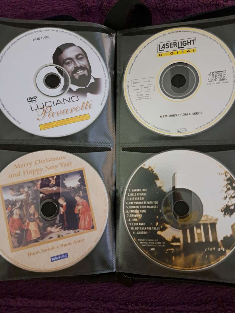 Music CDS. WITH POUCH ABOUT 60CDS MUSIC MUSIC