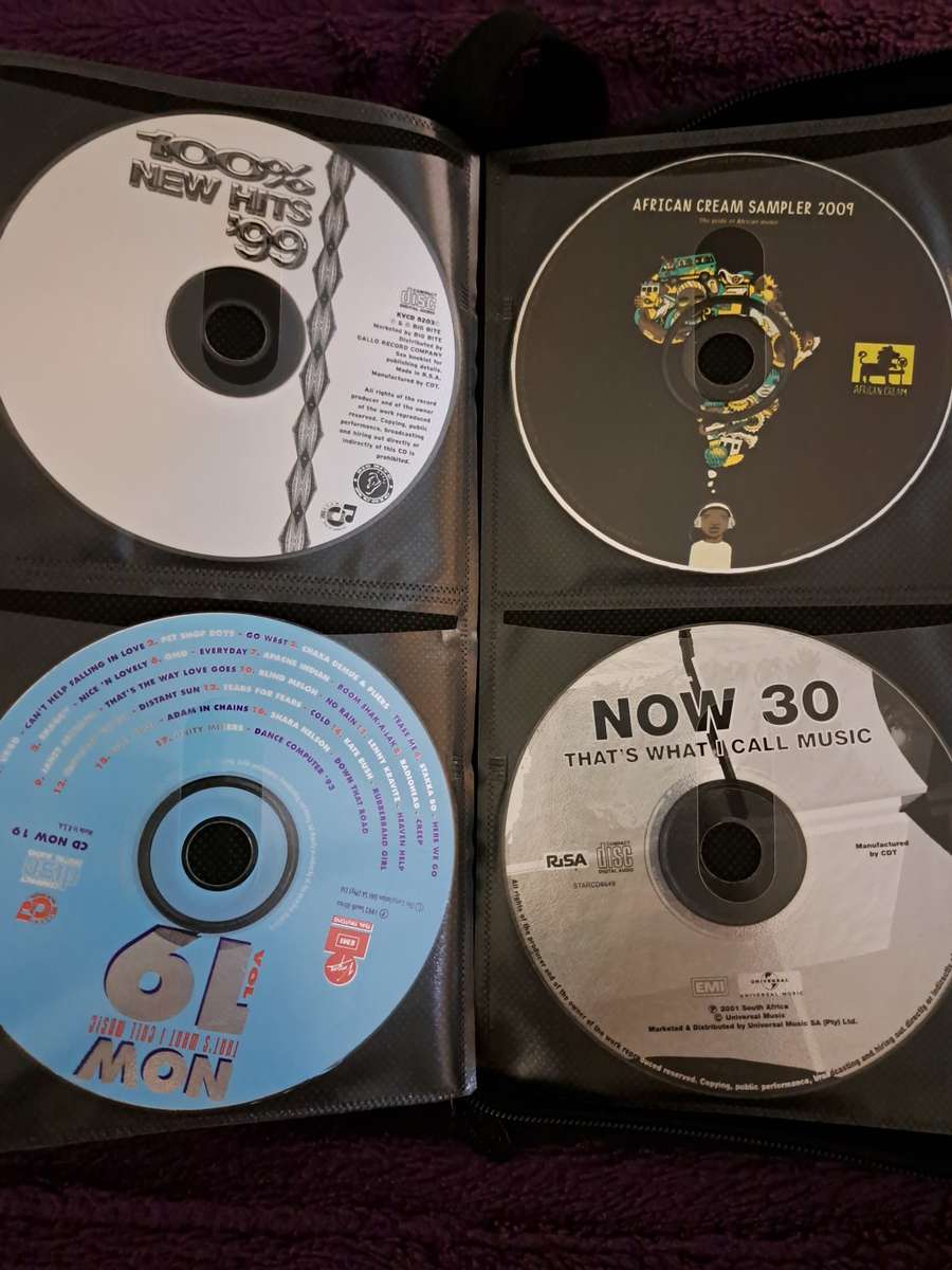 Music CDS. WITH POUCH ABOUT 60CDS MUSIC MUSIC