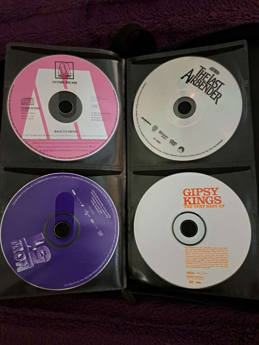 Music CDS. WITH POUCH ABOUT 60CDS MUSIC MUSIC