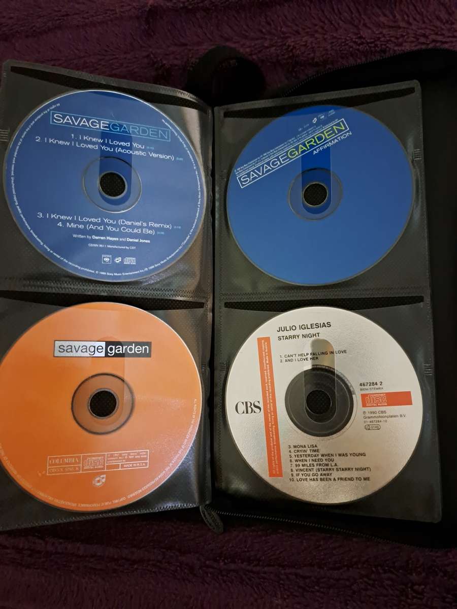 Music CDS. WITH POUCH ABOUT 60CDS MUSIC MUSIC