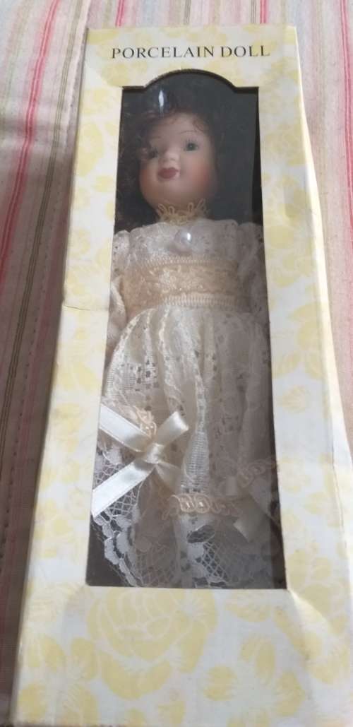 Porcelain Doll Cracker Barrel