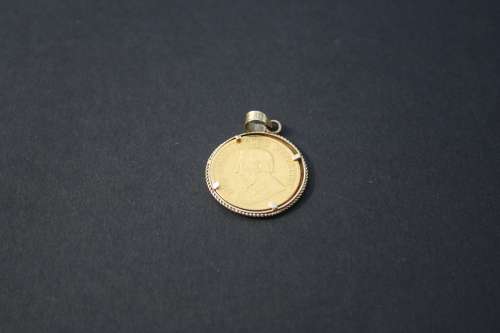 1895 1 POND IN GOLD PENDANT