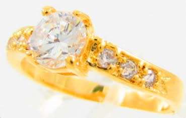 Stunning ring with simulated diamonds in 10k yellow gold overlay