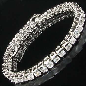Simulated diamond tennis  bracelet set in white gold overlay