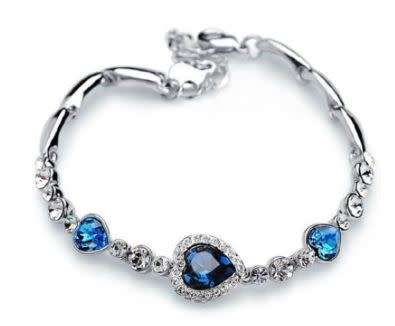 Blue heart shaped rhinestones on silver alloy bracelet