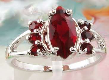 Marquise cut simulated  ruby ring in white gold overlay