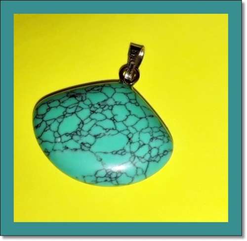 Beautiful oblong shaped turquoise stone pendant