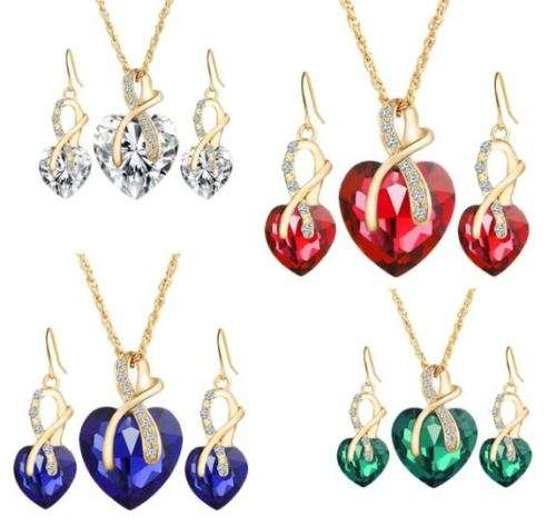 Crystal heart pendant and earring set gold plated - white sim stones