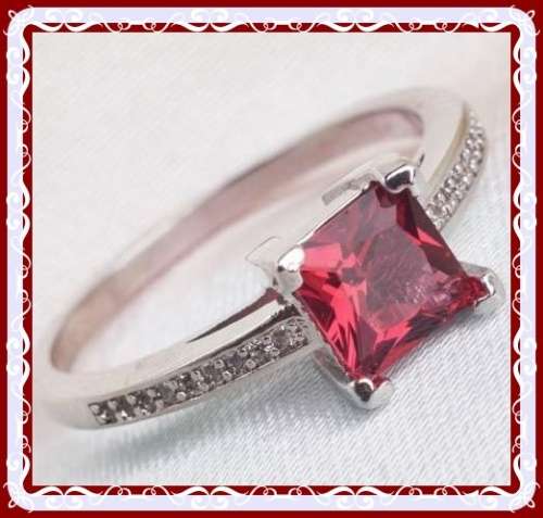 Gorgeous gold plated with simulated ruby S8