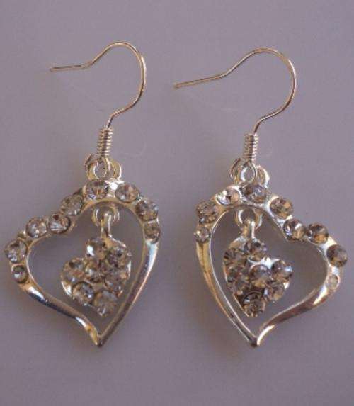 Beautiful Heart Earrings with dangling hearts inside