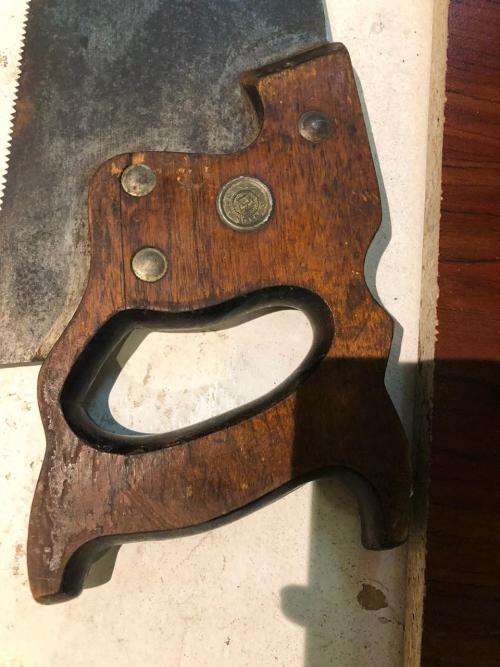 A Set of Three Disston Handsaws