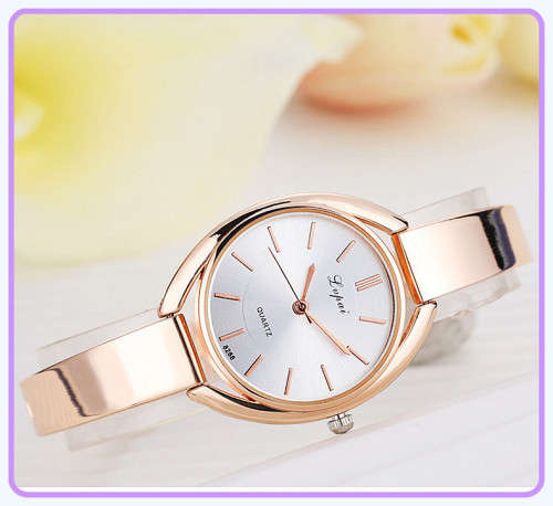 --***LADIES **ELEGANT,BEAUTIFUL and FEMININE** GOLD QUARTZ WATCH**