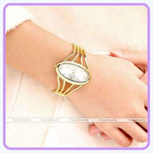 --***LADIES *ELEGANT **CANSNOW **GOLDEN BANGLE **QUARTZ WATCH**