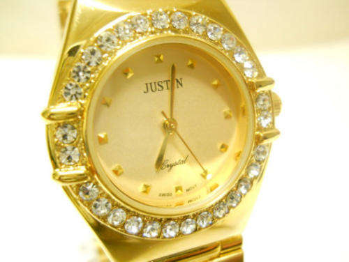 -MODERN JUSTIN STEEL DRESS WATCH-GOLD COLOURED