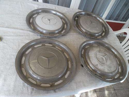 4 vintage Mercedes metal wheel caps for buyer soilielo only