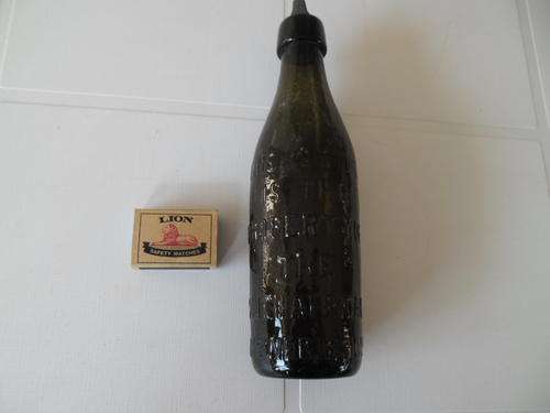 very old south African breweries beer bottle with lid