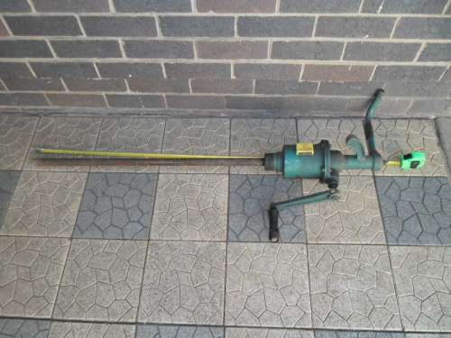 large old heavy B.P. metal oil pump size is 1240mm long weighs 10kg