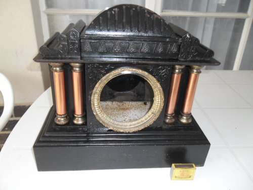 Very rare large cast iron mantel clock housing only weighs 14kg size is 400mm wide postage is R360