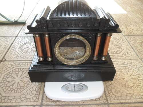Very rare large cast iron mantel clock housing only weighs 14kg size is 400mm wide postage is R360