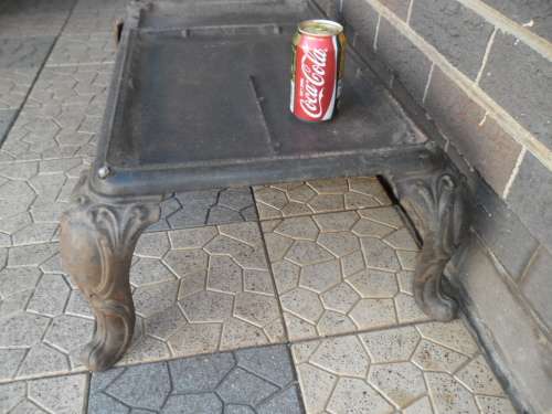 Old cast iron coal stove bottom stand size 780mm long with the 4 legs collection only