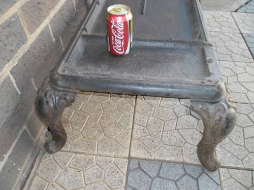Old cast iron coal stove bottom stand size 780mm long with the 4 legs collection only