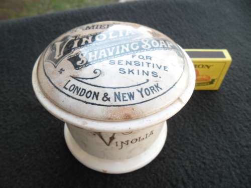 A Vinolia Shaving soap pot and lid see condition with cracks postnet postage R120