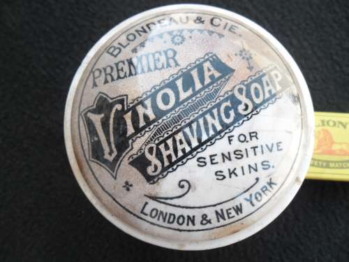 A Vinolia Shaving soap pot and lid see condition with cracks postnet postage R120