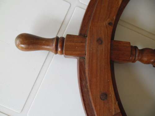 Center brass Porthole with clock working and wood ships wheel add to your order postnet postage R220