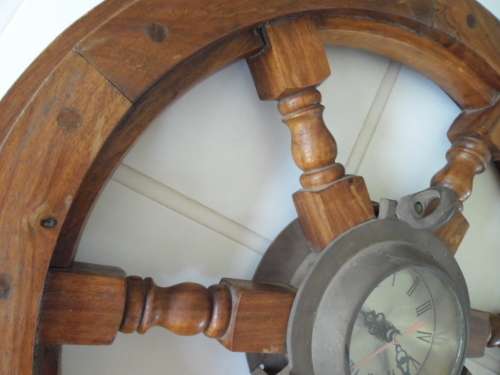Center brass Porthole with clock working and wood ships wheel add to your order postnet postage R220