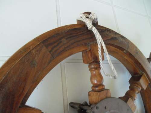 Center brass Porthole with clock working and wood ships wheel add to your order postnet postage R220