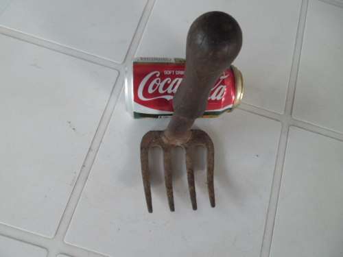 old stunning metal with wood handle garden tool