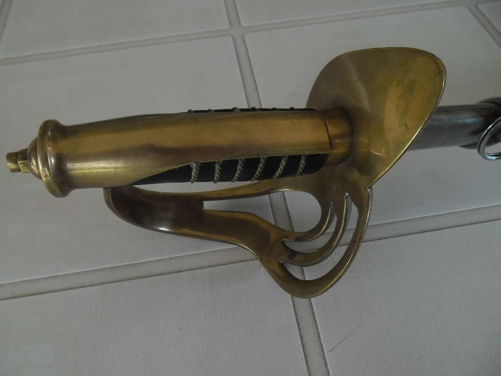 Rare Sword stamped India with brass hilt and metal scabbard total length 1065mm long