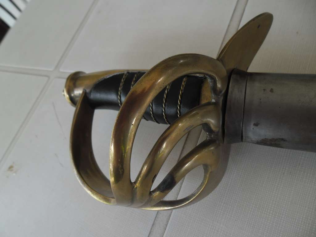 Rare Sword stamped India with brass hilt and metal scabbard total length 1065mm long