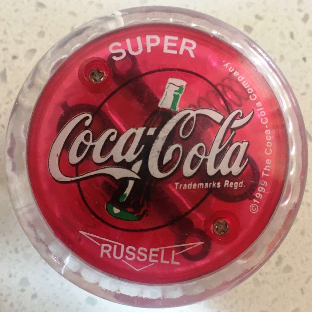 YoYo SUPER RUSSELL Coca Cola, with internal LEDs that light up Trademarks regd.1999