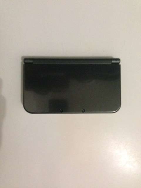 New Nintendo 3DS XL with FIVE GAMES!