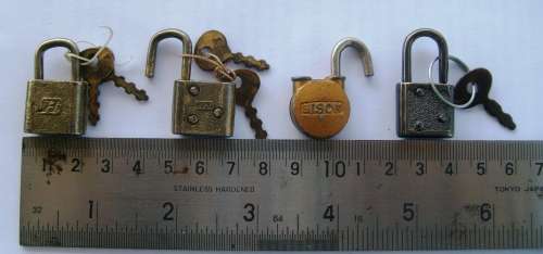 Collection of 11 miniature padlocks with keys
