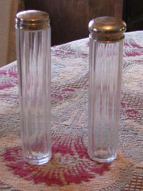 Two Hairpin Glass Bottles with Silver Tops