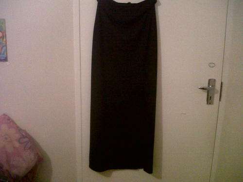 Long black skirt with slit. size 10
