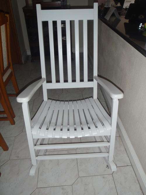 **WHITE WOODEN ROCKING CHAIR**