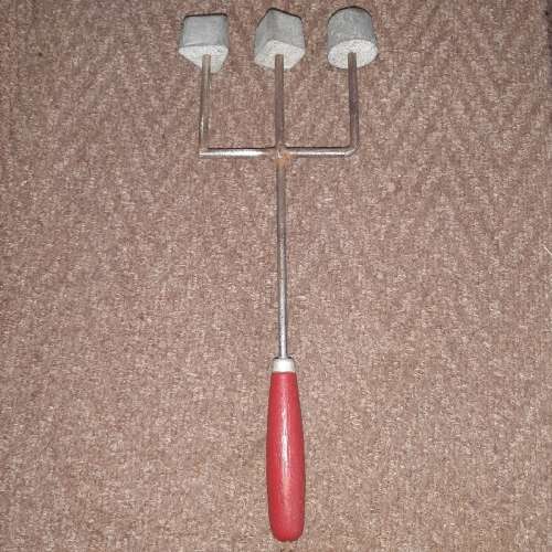 Vintage Snackle with red wooden handle