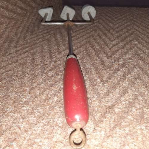 Vintage Snackle with red wooden handle