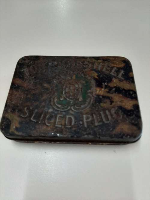 Vintage Tortoise Shell Sliced Plug Tin - Rusted